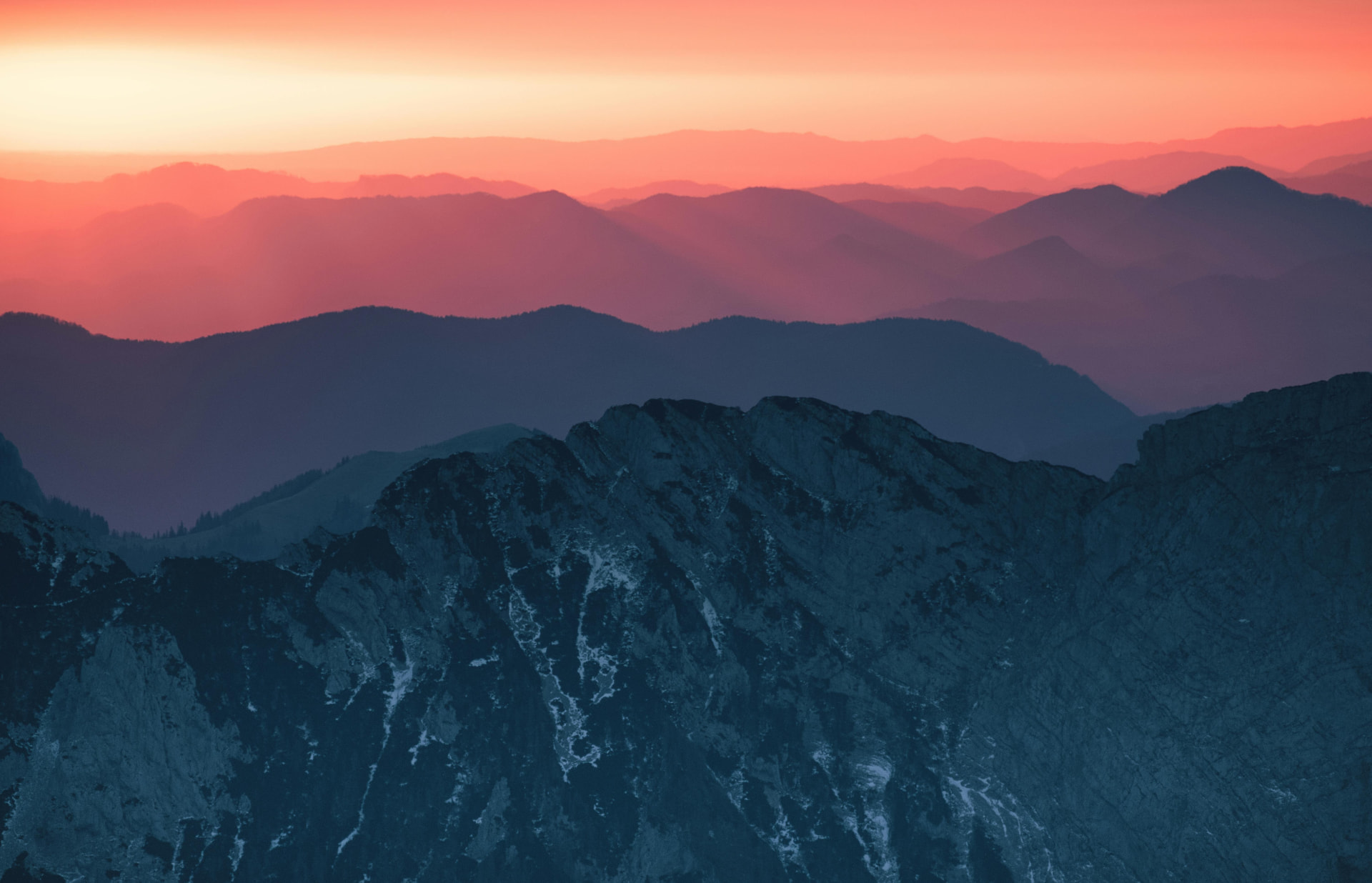 Layered mountain ridges at dusk