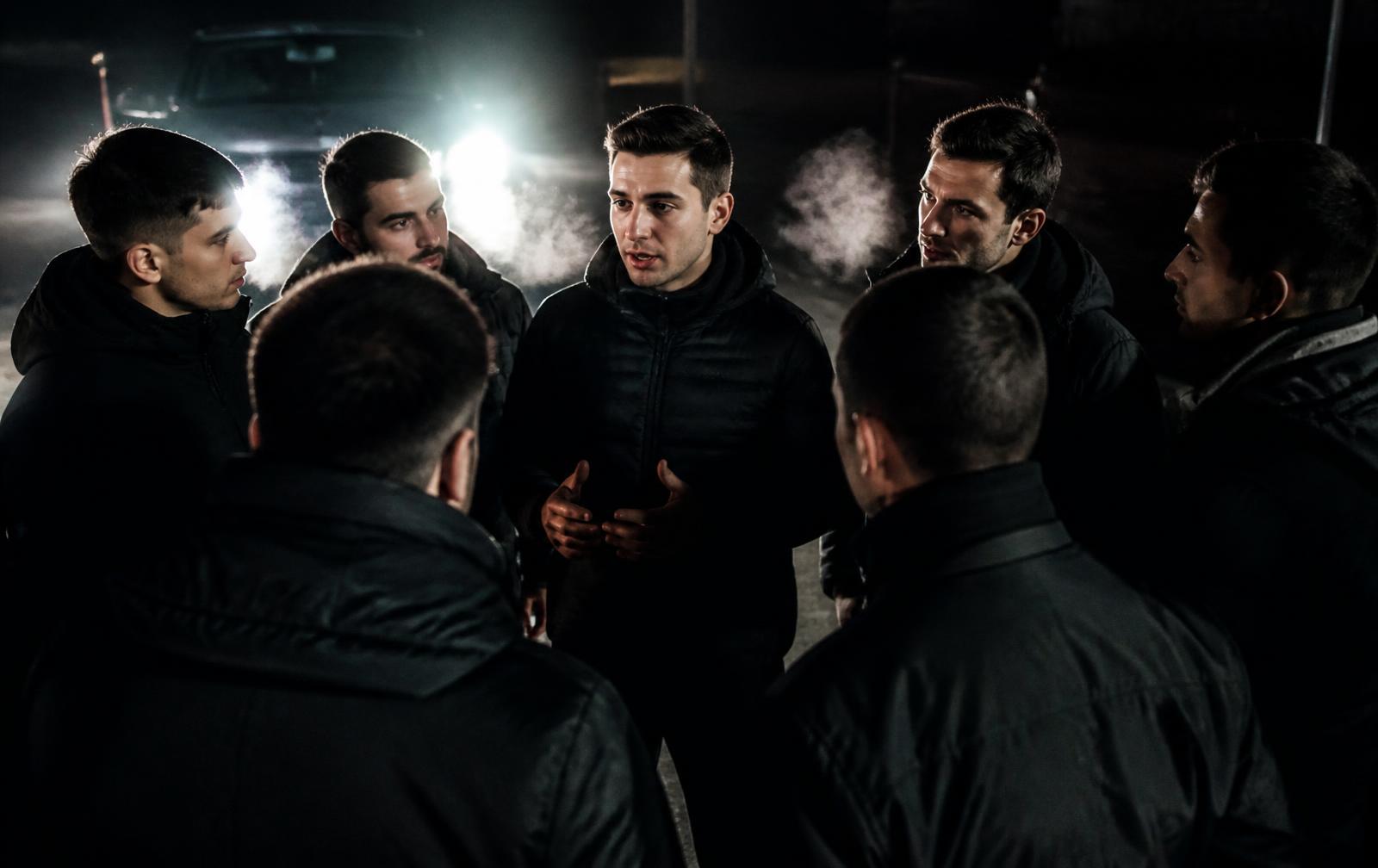 Factory team huddle before a shift